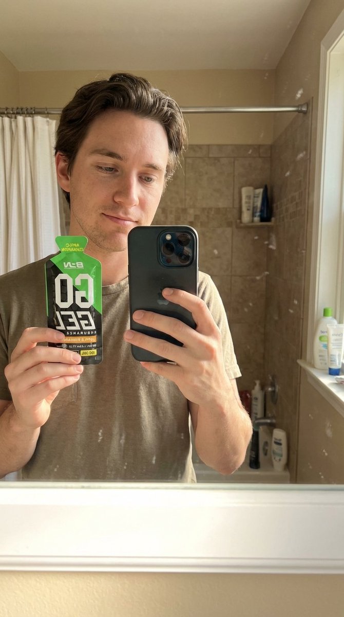 A Hyper-realistic Mirror Selfie of a Person Holding the Product in