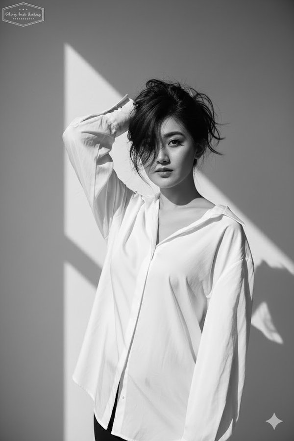 A Black and White High-fashion Editorial Portrait of Me Keeping My